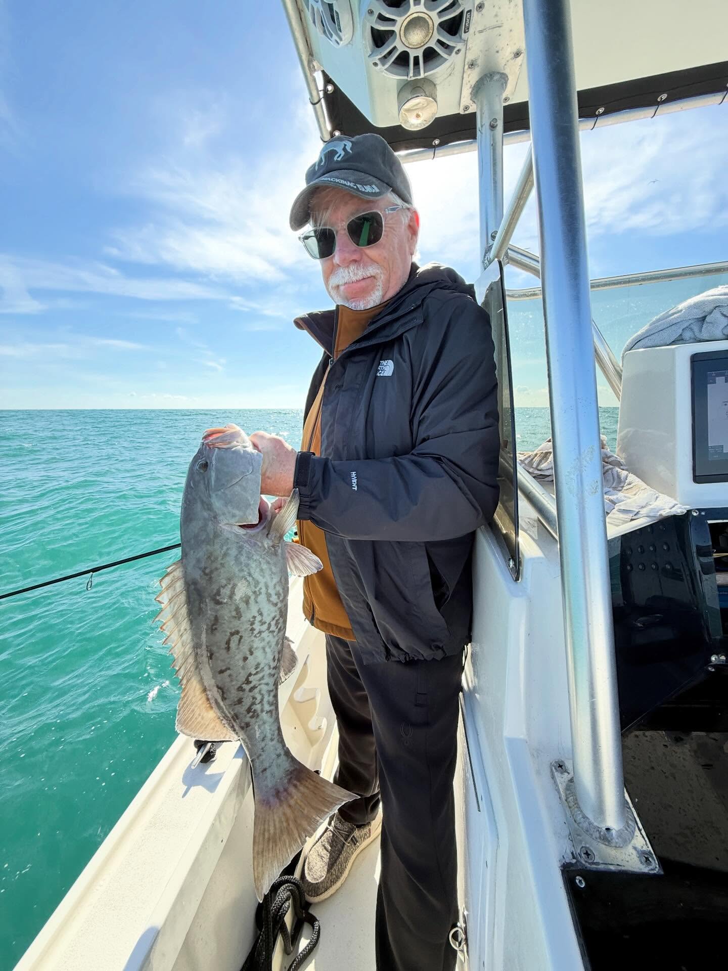 Solo angler with a fish caught on a single angler inshore trip